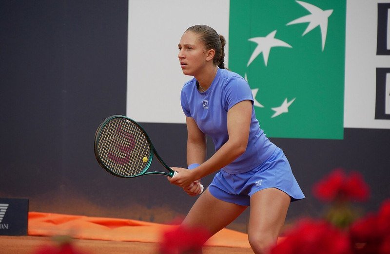 Diane Parry prepares to return the ball during a tennis match at the 2026 Italian Open