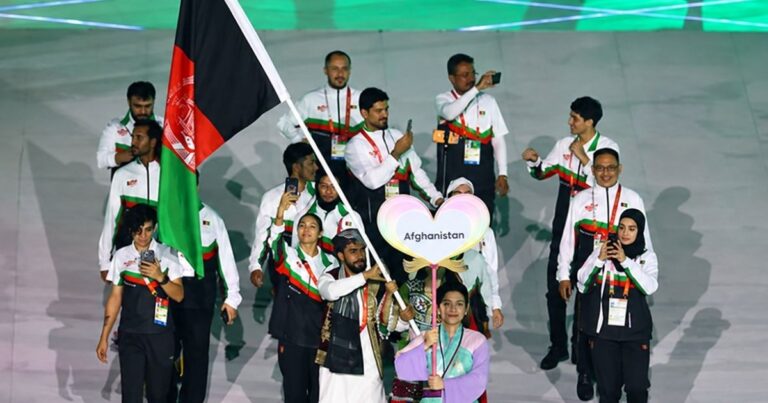 Afghanistan athletes march during the opening ceremony of the 2026 Asian Games in Nagoya, Japan