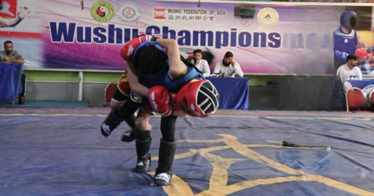 Wushu athletes competing in a Sanda tournament in Kabul