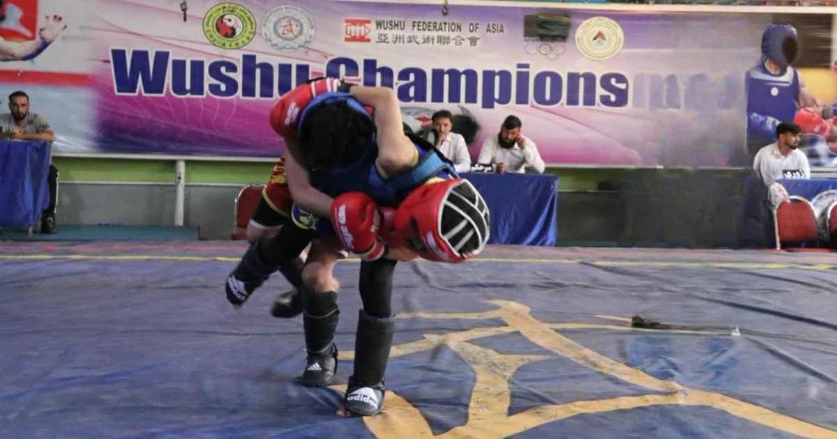 Wushu athletes competing in a Sanda tournament in Kabul