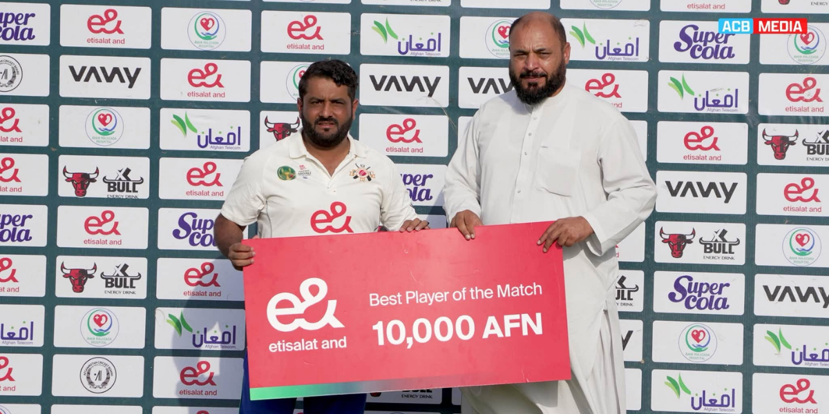 Mohammad Shahzad receives the Player of the Match award after scoring 225 for Pamir Legends in Khost