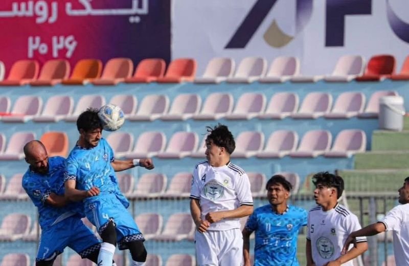 Football players compete during a sixth-season Afghanistan Champions League match in Kabul