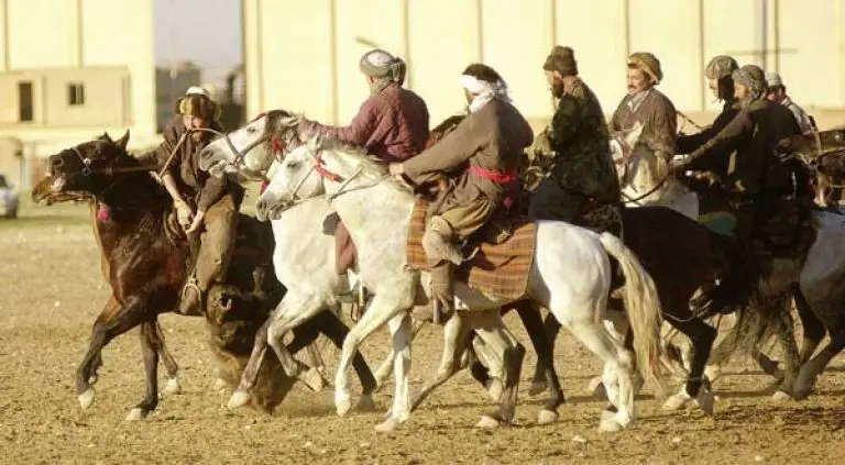 Buzkashi riders competing in Mazar-e-Sharif, Afghanistan