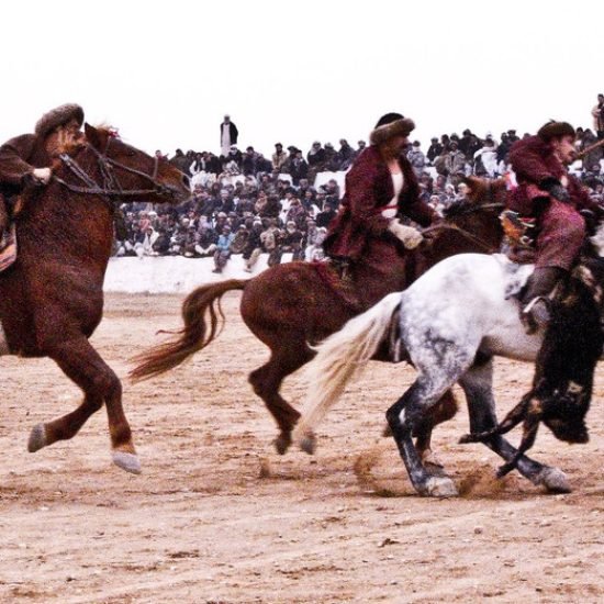 Afghan chapandaz riders competing in a buzkashi match in Mazar-e-Sharif