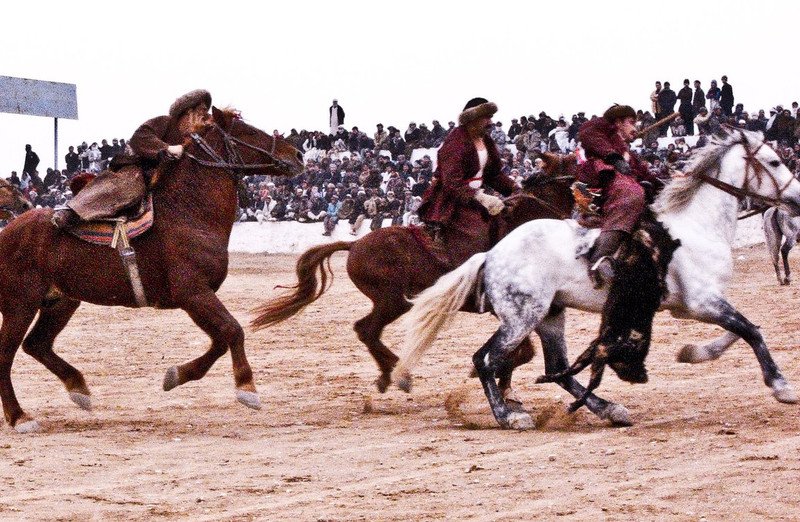 Afghan chapandaz riders competing in a buzkashi match in Mazar-e-Sharif