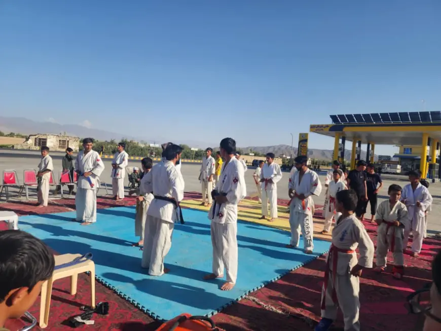 Wrestlers compete in the Youth Solidarity Cup in Baraki Barak district of Logar province