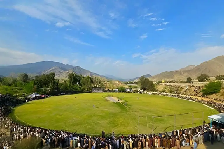 Cricket being played in Afghanistan in a mountainous setting