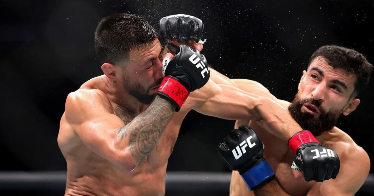 Farid Basharat competes against Chris Gutierrez during their UFC 320 bantamweight bout in Las Vegas.