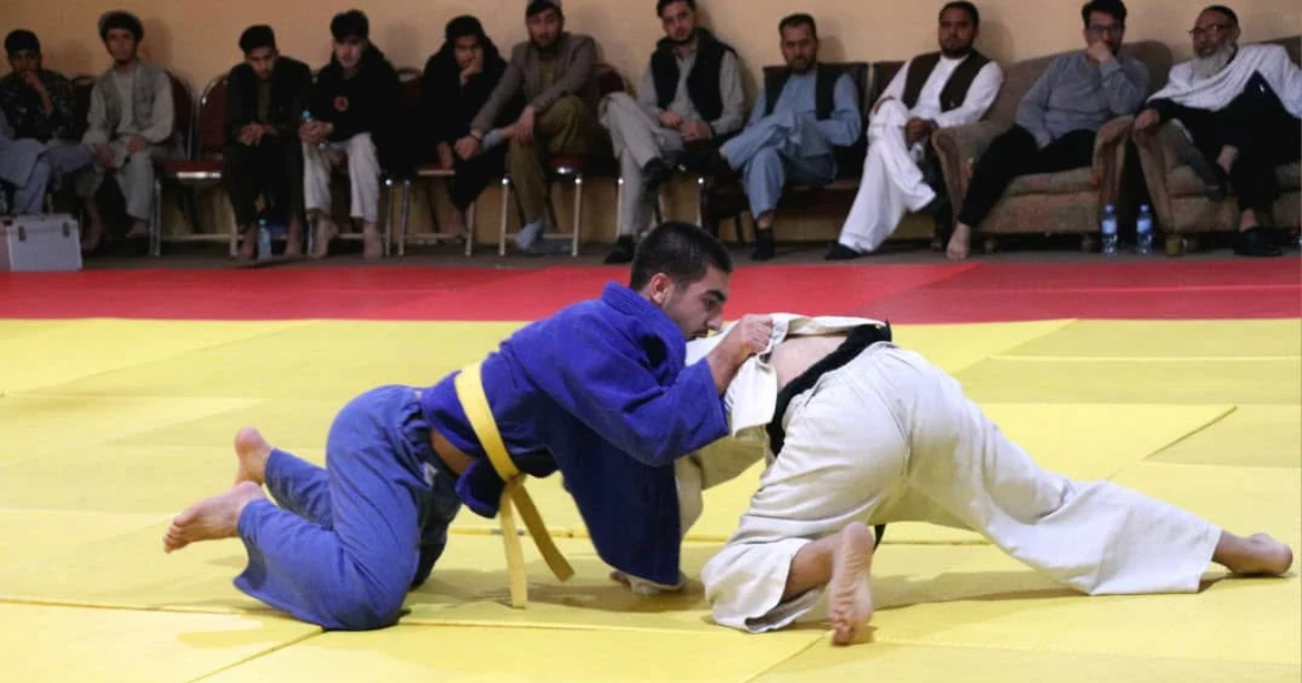 Judo athletes competing in the Kabul city selection tournament at the sports administration's judo gymnasium.