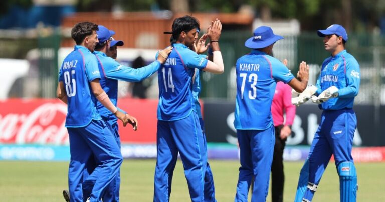Afghanistan Under-19 cricketers celebrate a wicket