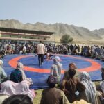 په کاپیسا کې د غېږنیونې د سیالیو پر مهال ورزشکاران او نندارچیان