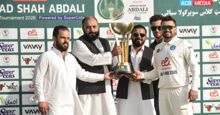 Mahipar Stars representatives receive the Ahmad Shah Abdali first-class trophy